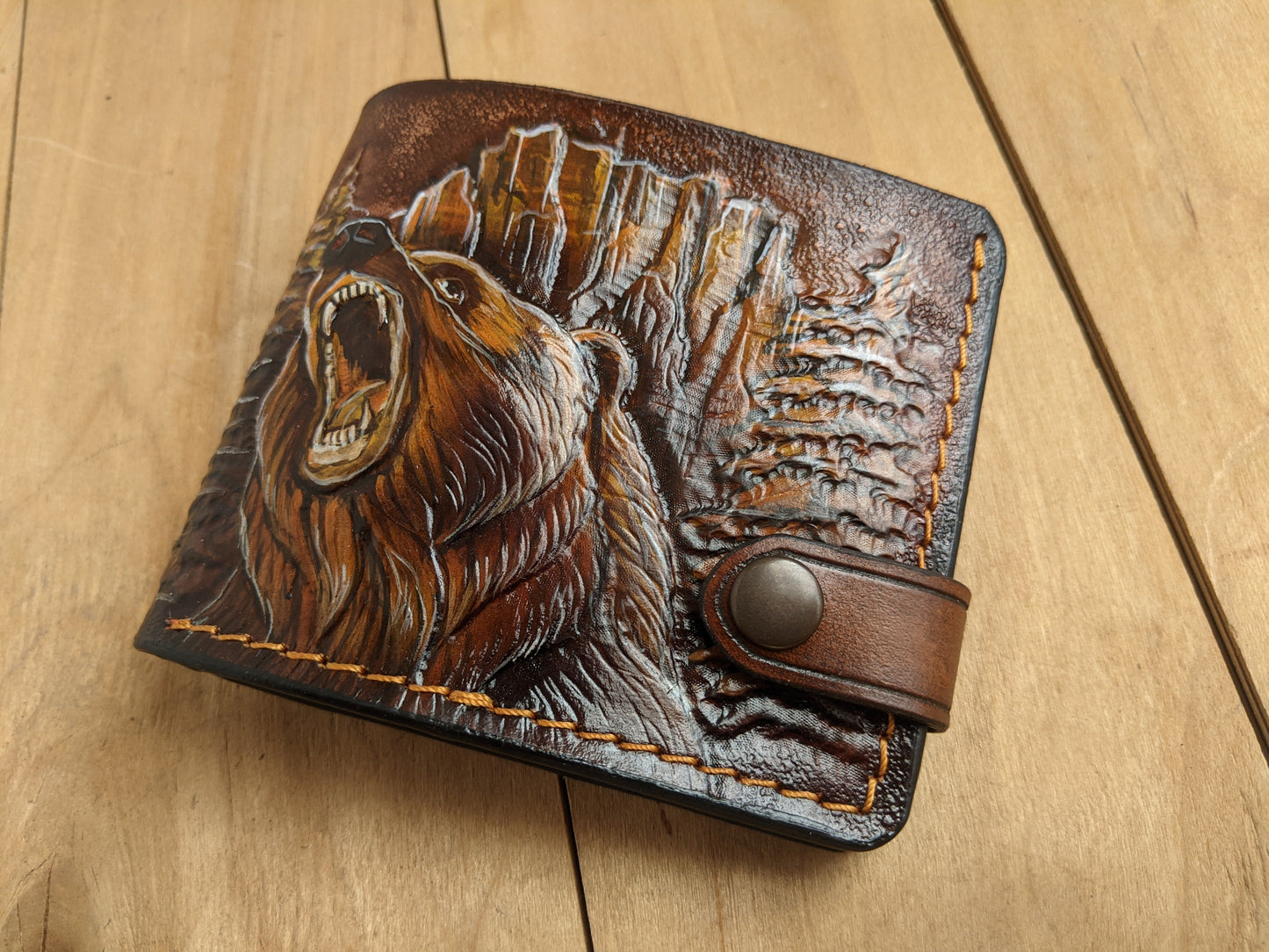 Handmade grizzly bear embossed leather bifold wallet for hunters. Perfect Father’s Day gift for him with RFID protection.
