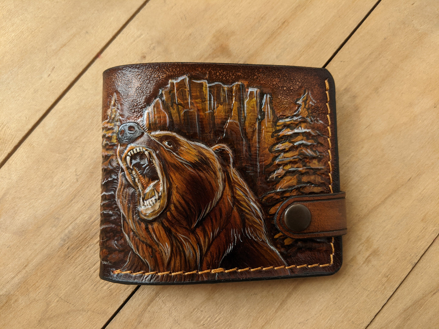 Handmade grizzly bear embossed leather bifold wallet for hunters. Perfect Father’s Day gift for him with RFID protection.