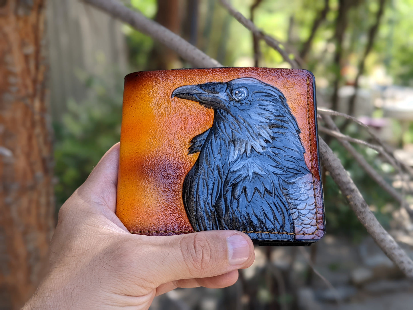 Handmade Odin Raven Huginn & Muninn bifold leather wallet. Embossed Crow with gothic fantasy art. Features RFID protection.