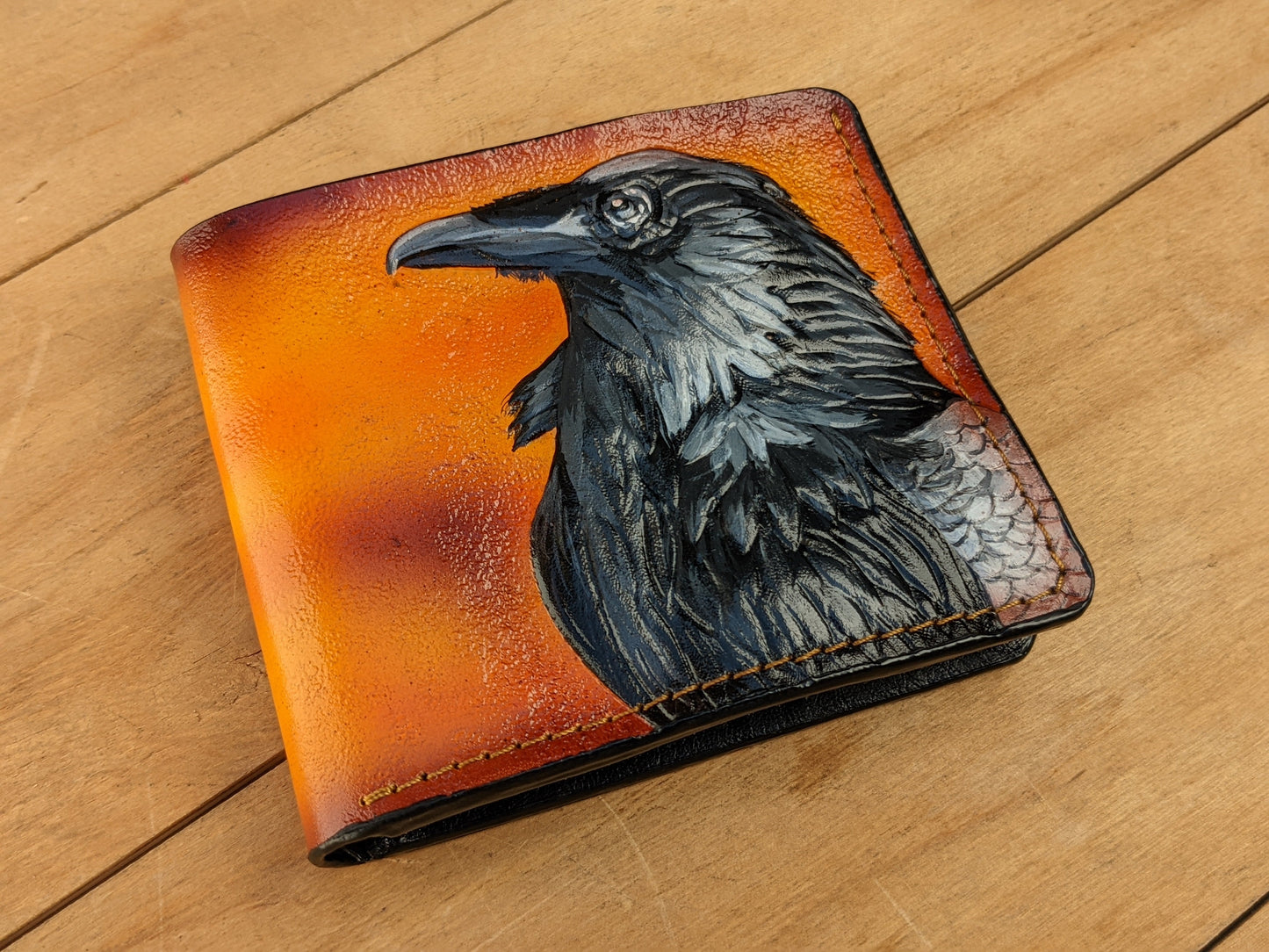 Handmade Odin Raven Huginn & Muninn bifold leather wallet. Embossed Crow with gothic fantasy art. Features RFID protection.