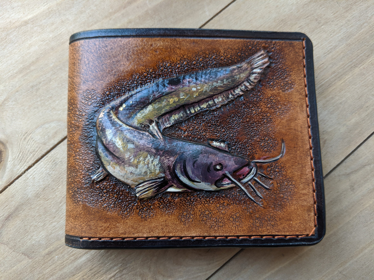 Discover the Catfish Handmade Leather Wallet! Perfect for anglers, this RFID-protected fish wallet is a thoughtful Father's Day gift for the outdoorsman.
