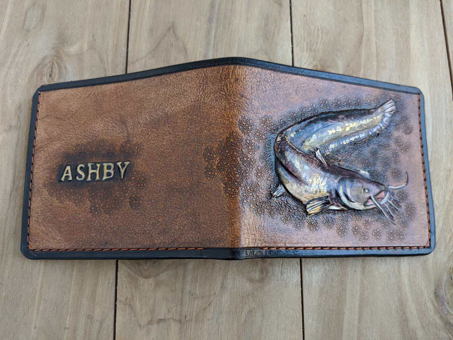 Discover the Catfish Handmade Leather Wallet! Perfect for anglers, this RFID-protected fish wallet is a thoughtful Father's Day gift for the outdoorsman.