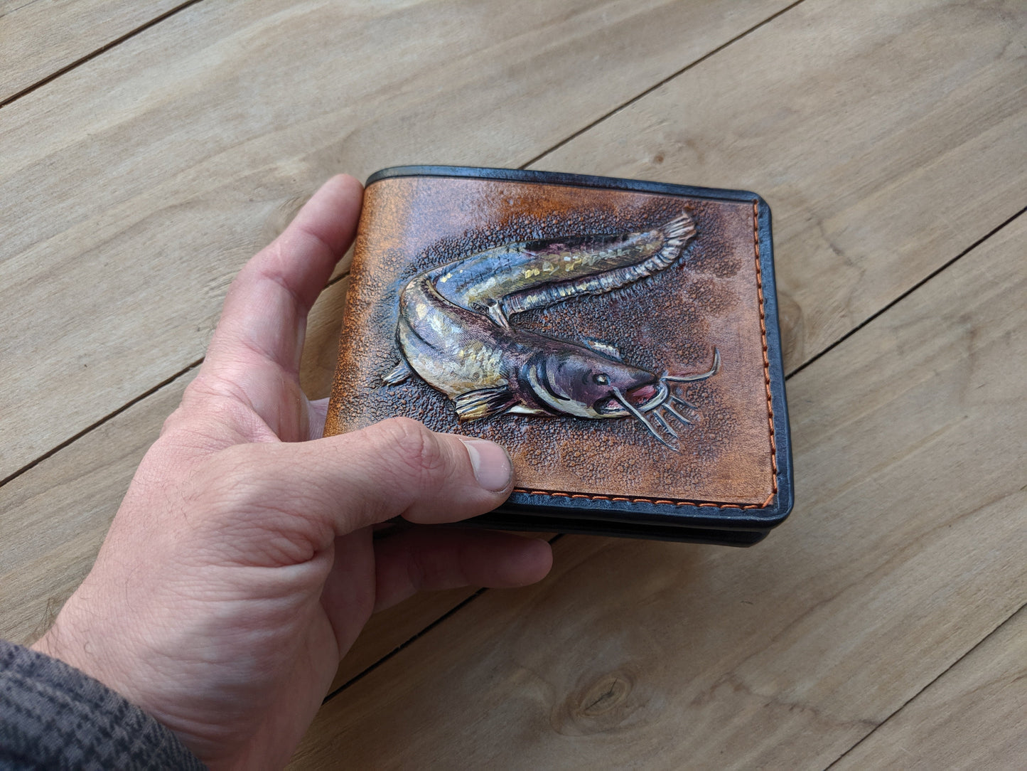 Discover the Catfish Handmade Leather Wallet! Perfect for anglers, this RFID-protected fish wallet is a thoughtful Father's Day gift for the outdoorsman.