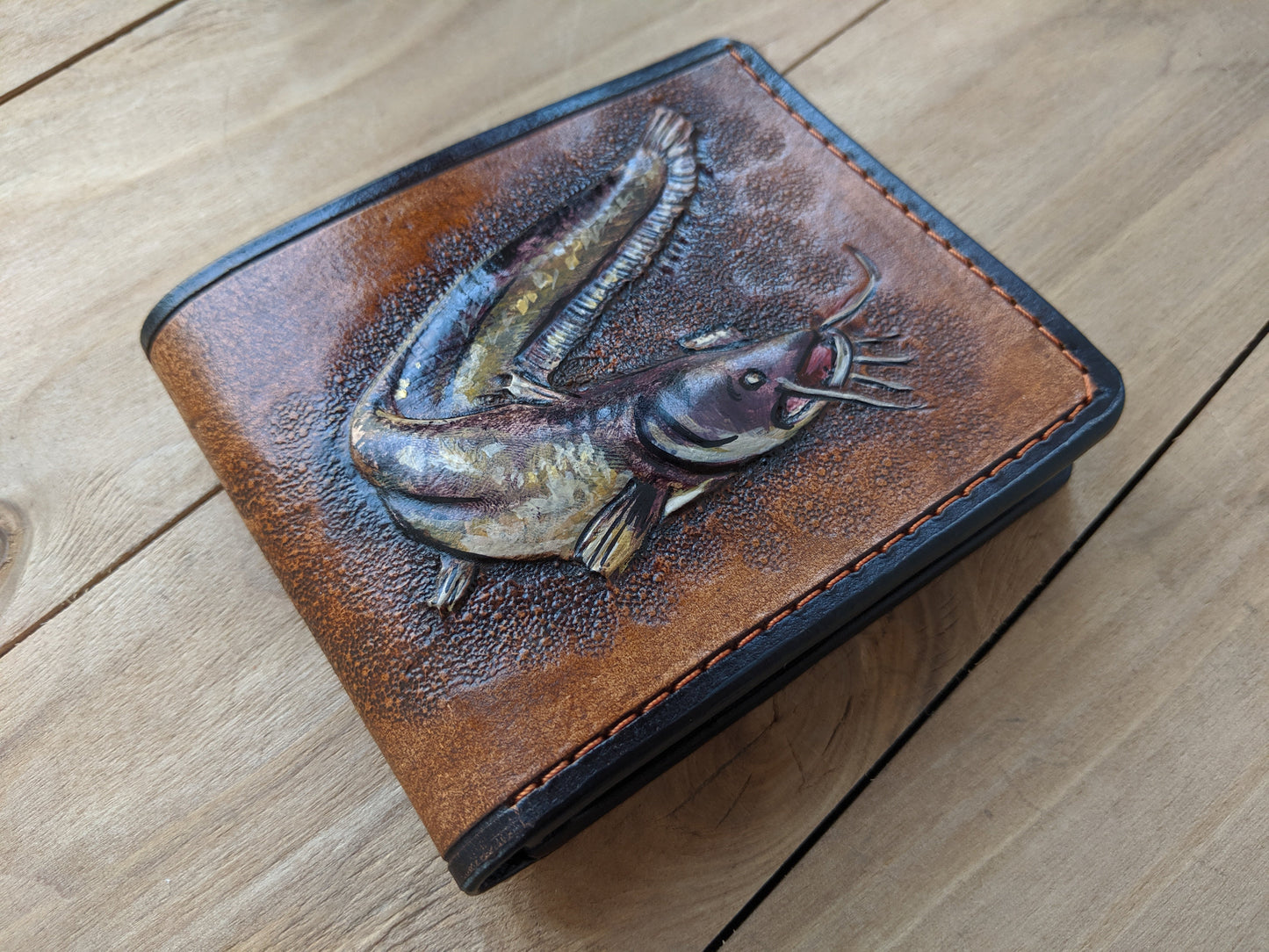 Discover the Catfish Handmade Leather Wallet! Perfect for anglers, this RFID-protected fish wallet is a thoughtful Father's Day gift for the outdoorsman.