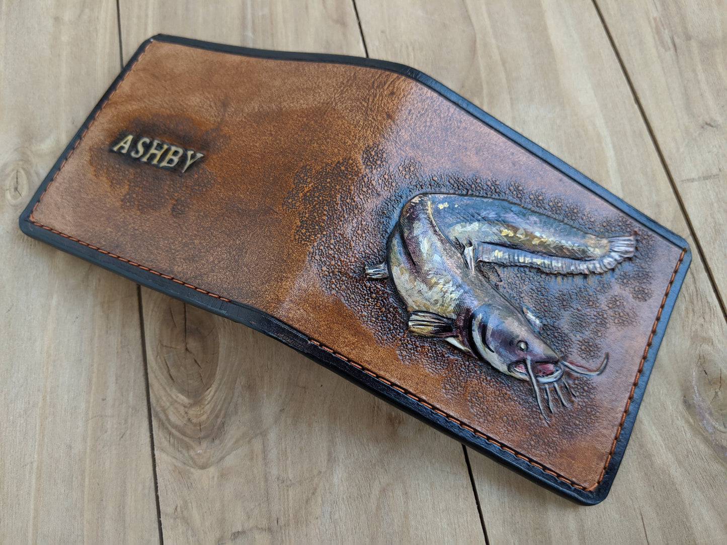 Discover the Catfish Handmade Leather Wallet! Perfect for anglers, this RFID-protected fish wallet is a thoughtful Father's Day gift for the outdoorsman.