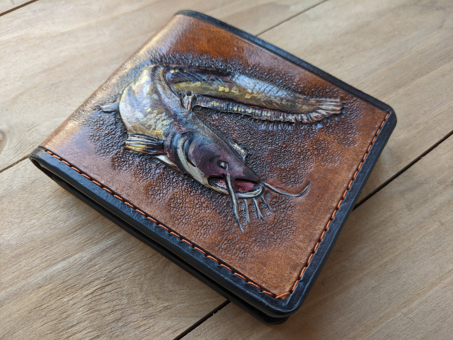 Discover the Catfish Handmade Leather Wallet! Perfect for anglers, this RFID-protected fish wallet is a thoughtful Father's Day gift for the outdoorsman.