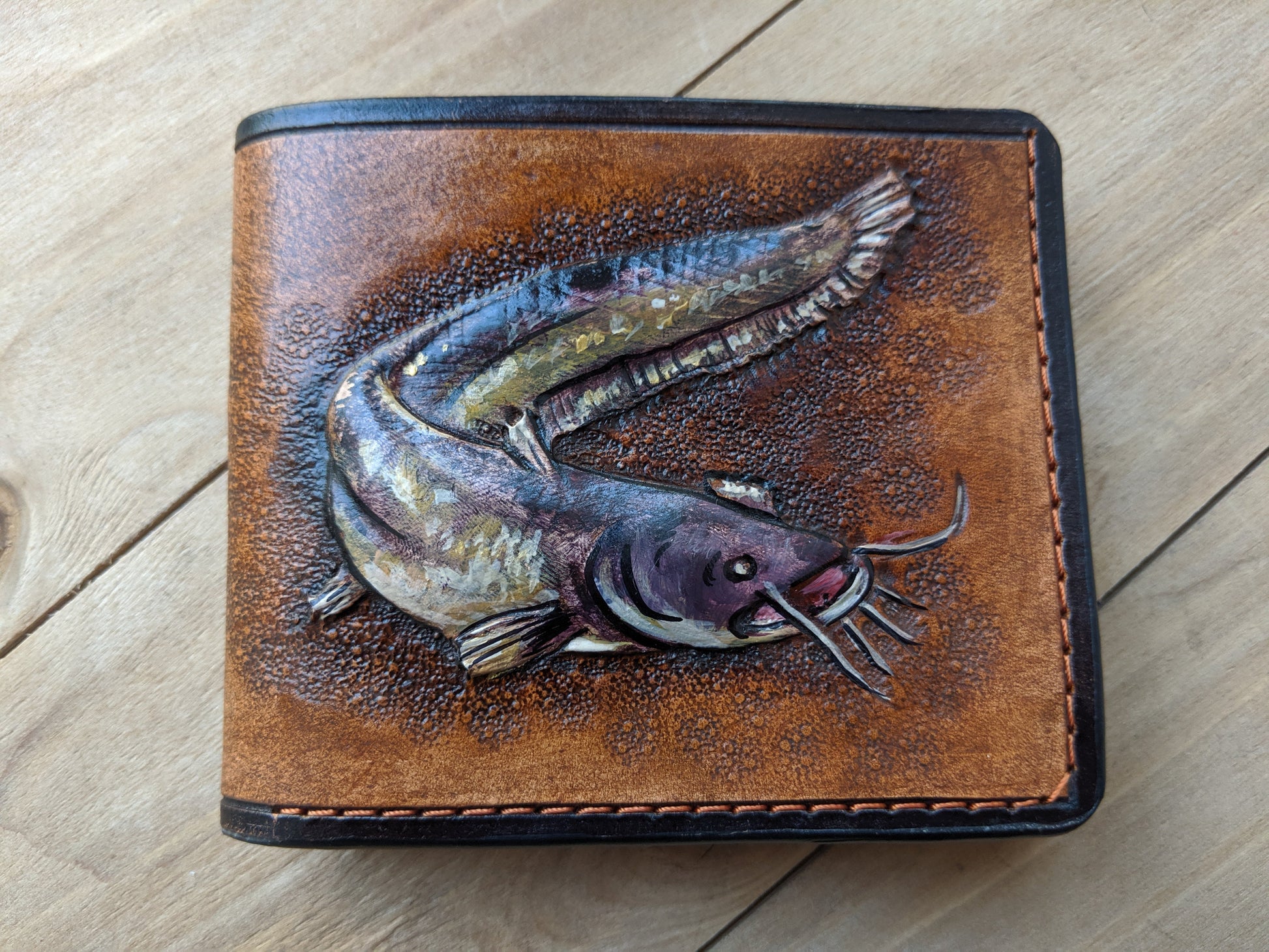 Discover the Catfish Handmade Leather Wallet! Perfect for anglers, this RFID-protected fish wallet is a thoughtful Father's Day gift for the outdoorsman.